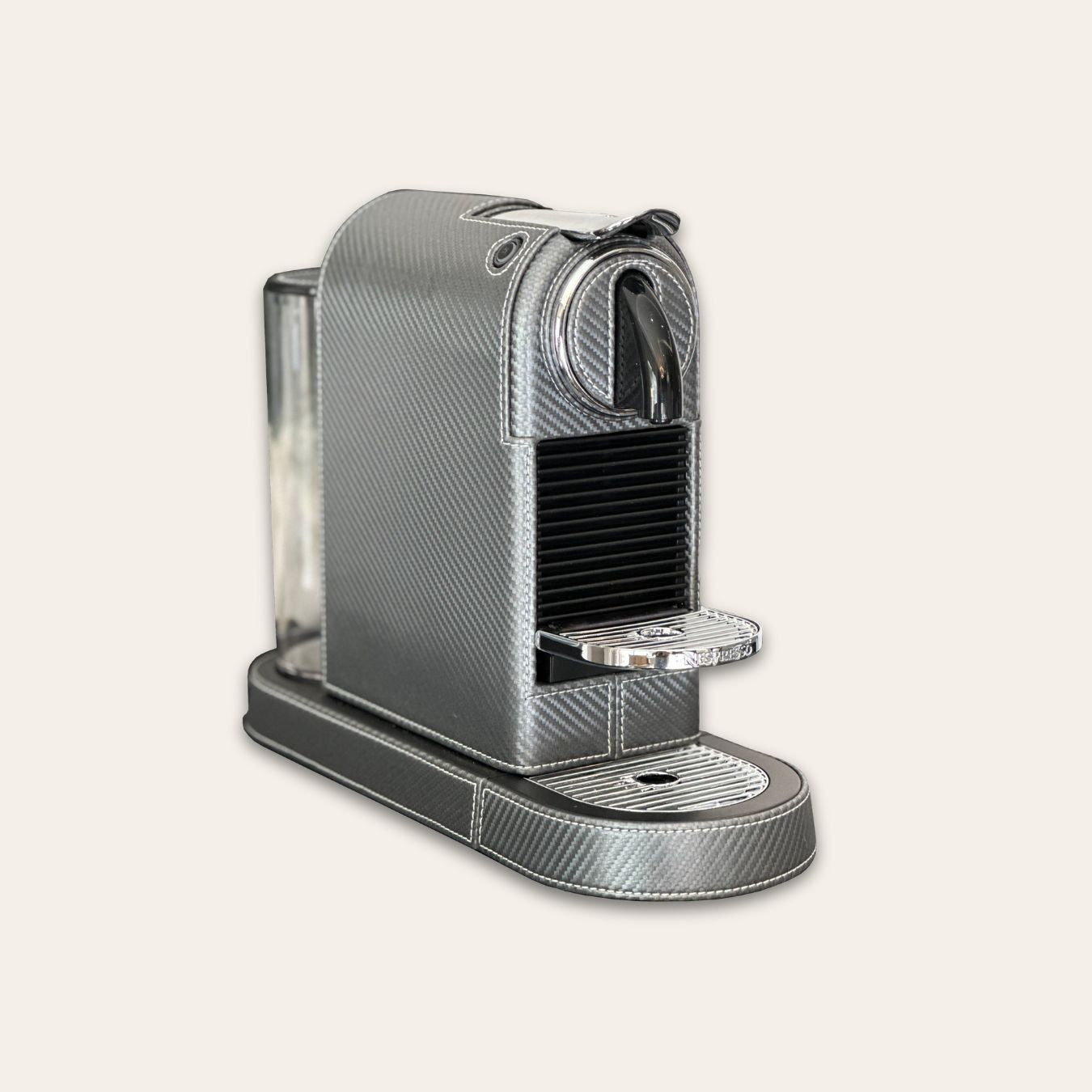 Stylish Citiz Nespresso coffee machine wrapped in a metallic carbon fibre effect vegan leather with a for an elegant living space