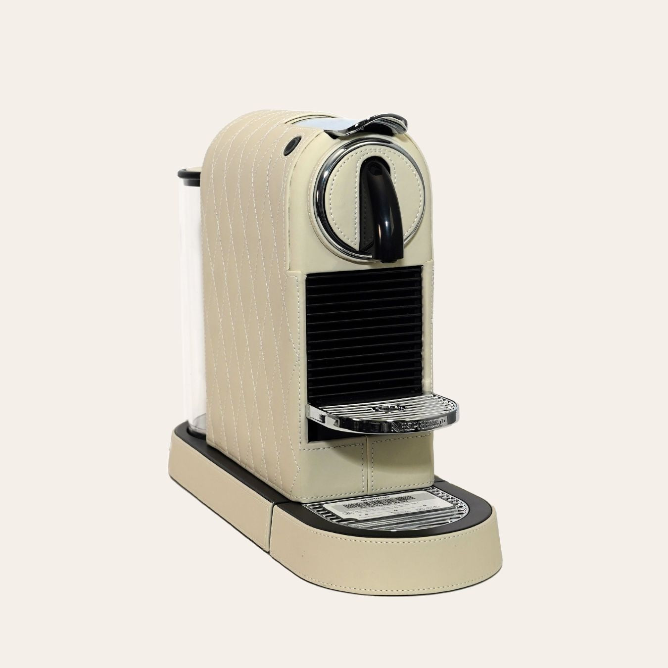 Stylish Citiz Nespresso coffee machine wrapped in luxurious cream white vegan leather with a diamond stitch pattern for an elegant living space