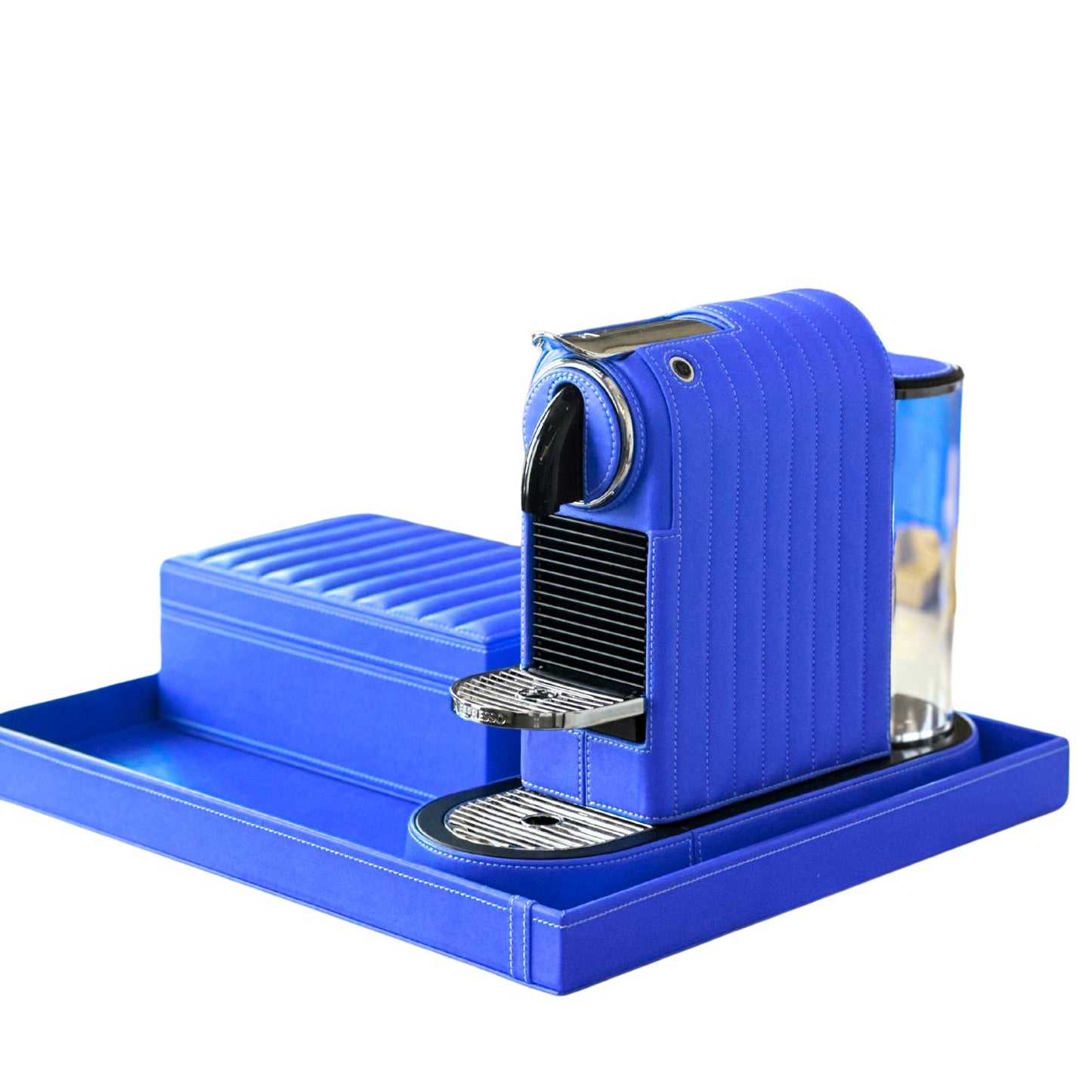Blue vegan leather covered Nespresso Citiz coffee machine with a storage box and tray