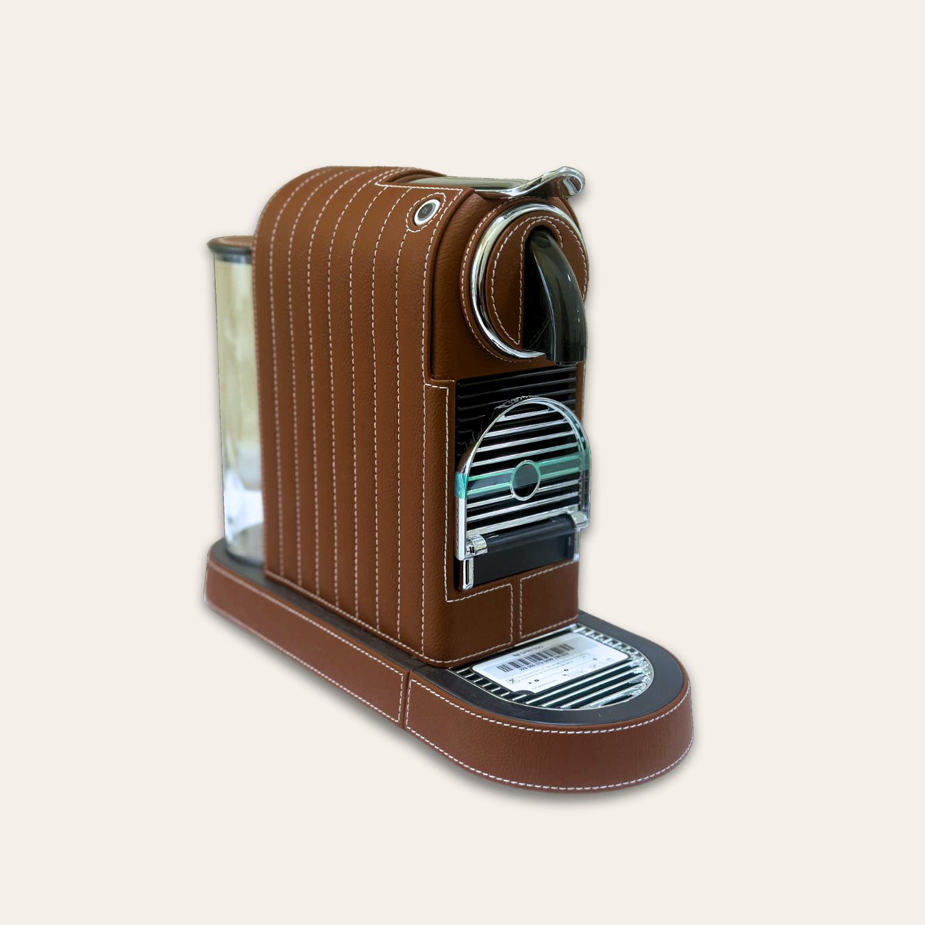 Stylish Citiz Nespresso coffee machine wrapped in luxurious chocolate brown vegan leather with a for an elegant living space