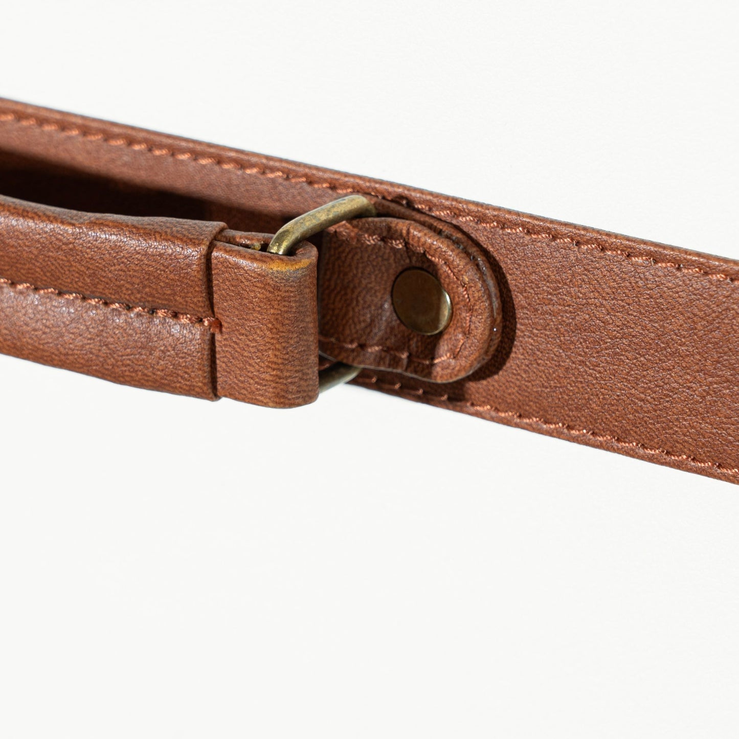 handle details on the luxe cabinet in tan vegan leather