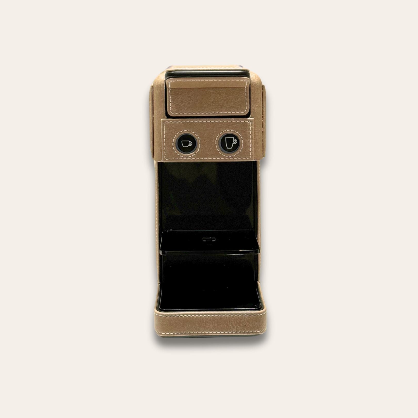 Front view of the Illy Y3.3 IperEspresso compact coffee capsule machine cladded in a taupe vegan leather made in the UAE
