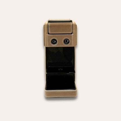 Front view of the Illy Y3.3 IperEspresso compact coffee capsule machine cladded in a taupe vegan leather made in the UAE