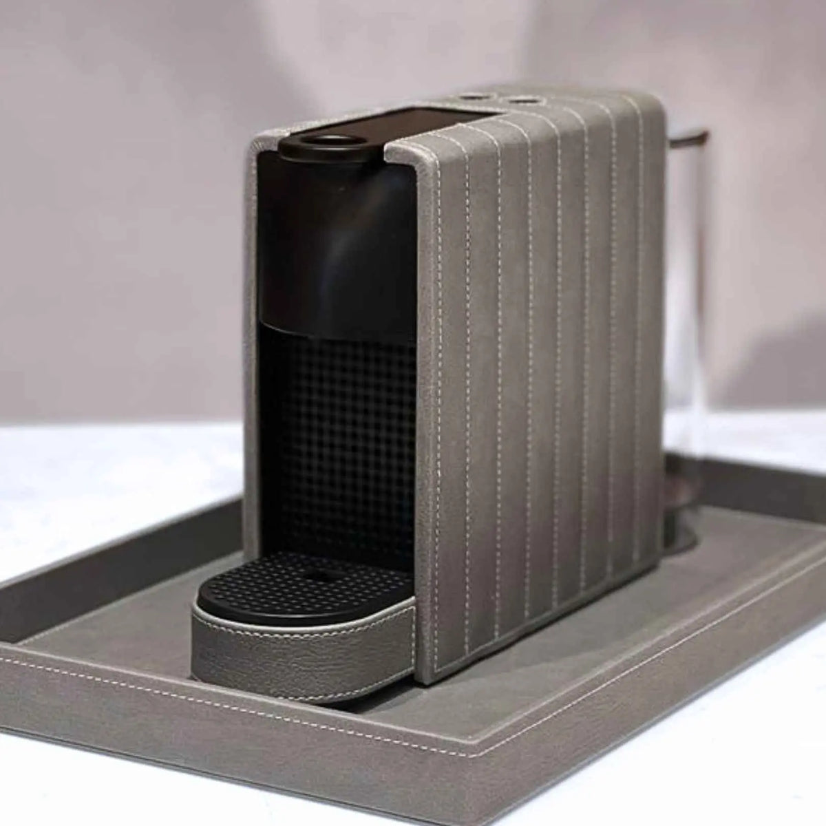 Essenza Mini – Leather-Clad Nespresso Machine