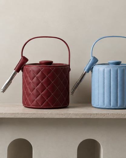 burgundy and sky blue leather wrapped ​Luxe Ice Bucket on shelf