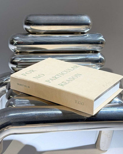 Taupe Cream decorative box with green text design on the outside